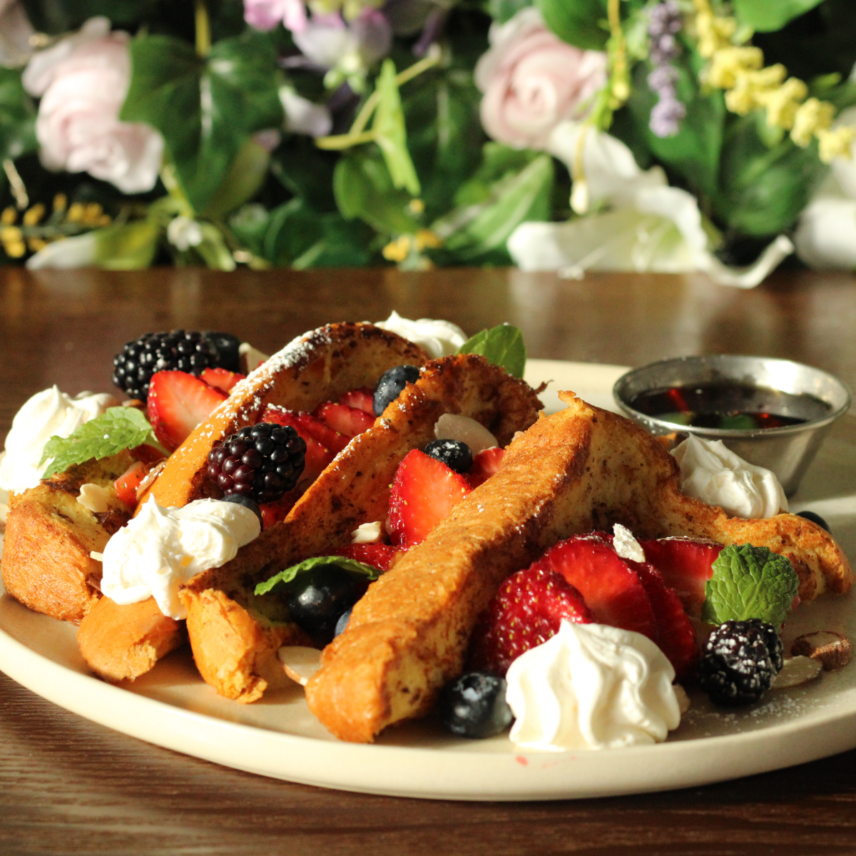 French toast with fresh berries and whipped cream